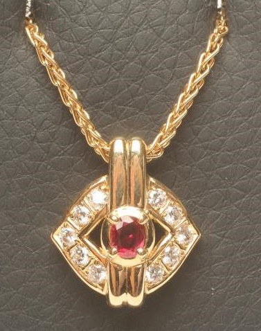 A RUBY AND DIAMOND PENDANT Image