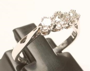 A THREE STONE DIAMOND RING Image