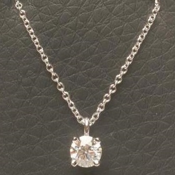 A TIFFANY SOLITAIRE DIAMOND PENDANT Image