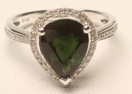A TOURMALINE AND DIAMOND DRESS RING Image