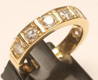 A SEVEN STONE DIAMOND HALF HOOP ETERNITY RING Image