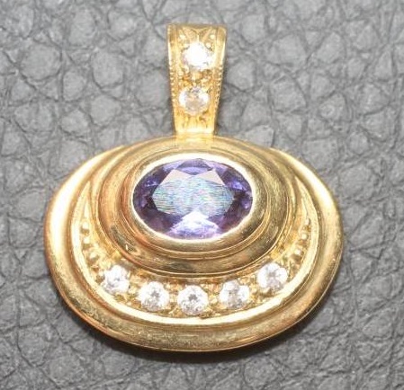 A PENDANT to match the previous lot Image