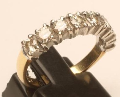 A DIAMOND HALF HOOP ETERNITY RING Image