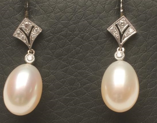 A PAIR OF PEARL DROP EARRINGS Image