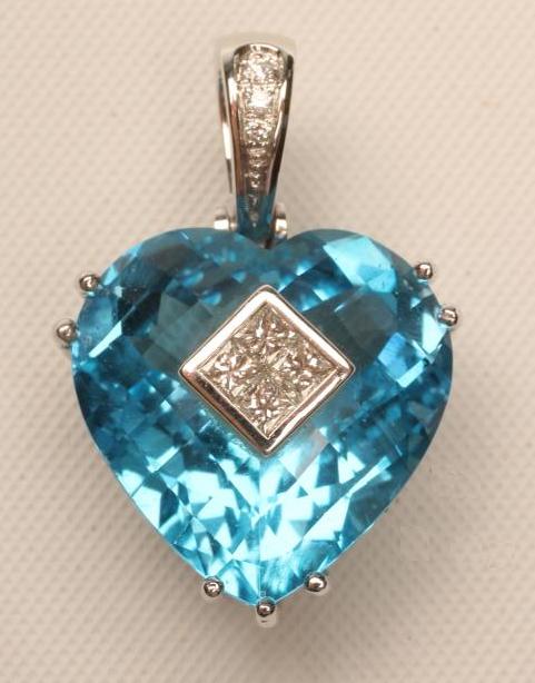 A TOPAZ AND DIAMOND PENDANT Image