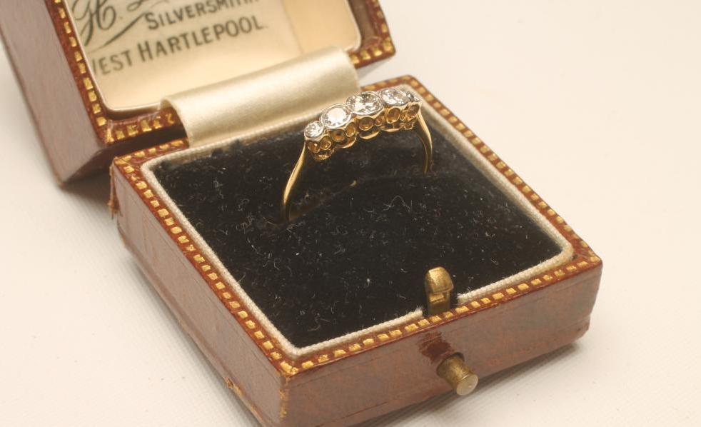 A FIVE STONE DIAMOND RING Image