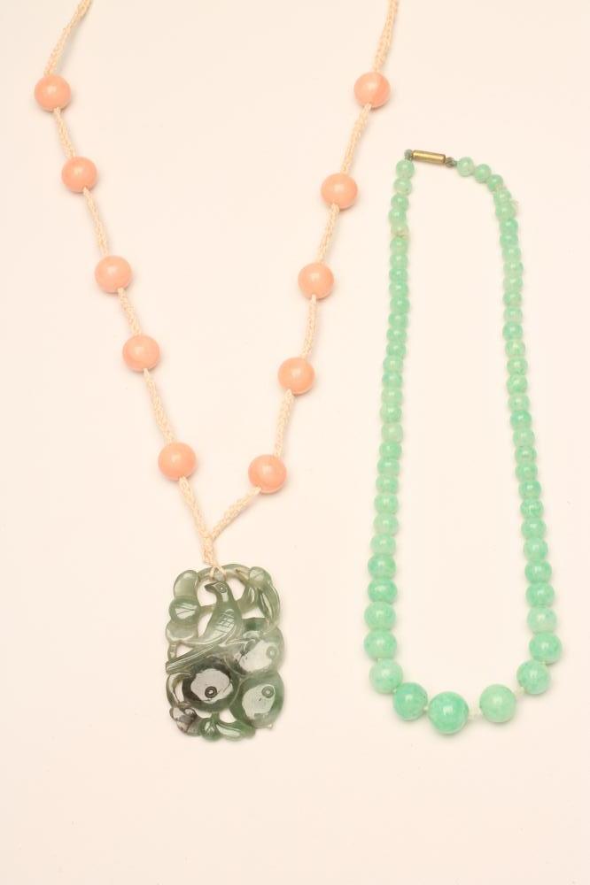 AN ART DECO JADEITE PENDANT of oblong form Image