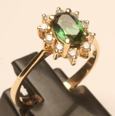 A TOURMALINE AND DIAMOND CLUSTER RING Image