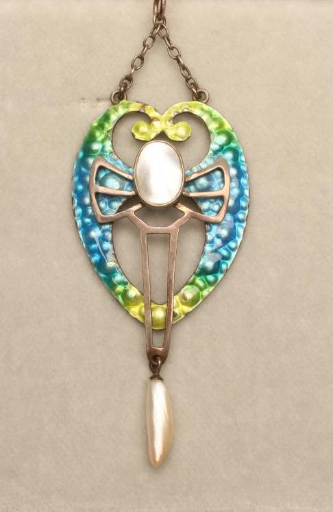 AN ARTS AND CRAFTS STERLING SILVER PENDANT Image