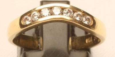 A SEVEN STONE DIAMOND HALF HOOP ETERNITY RING Image