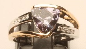 A TANZANITE AND DIAMOND DRESS RING Image