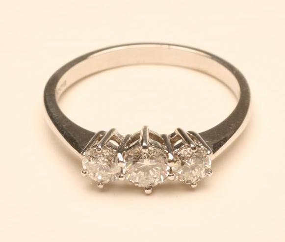 A THREE STONE DIAMOND RING Image