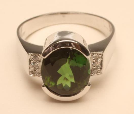A TOURMALINE AND DIAMOND RING Image