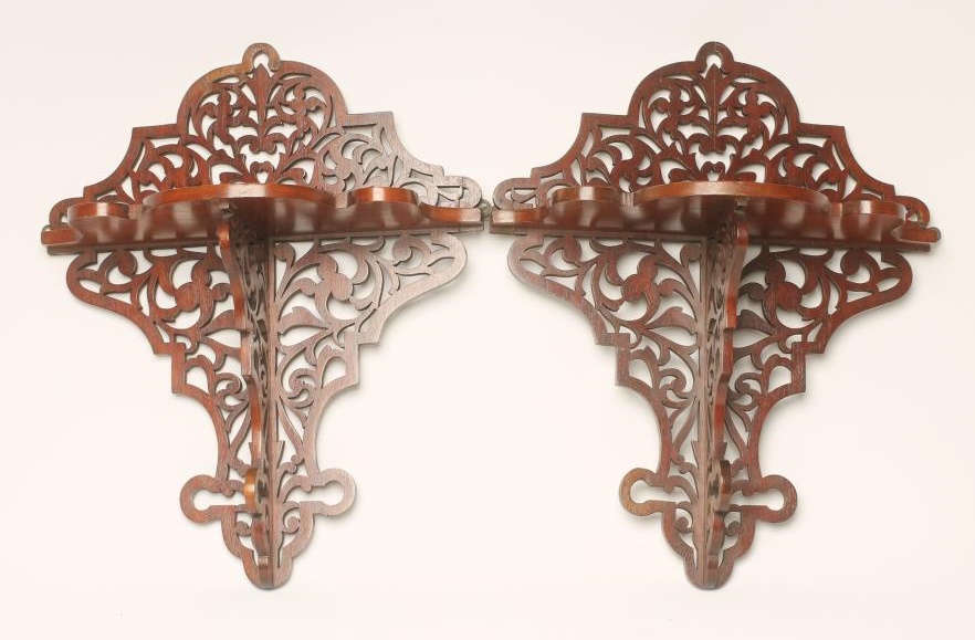 A PAIR OF VICTORIAN WALNUT WALL BRACKETS Image