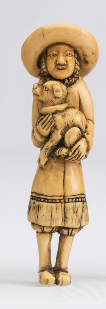 A JAPANESE IVORY NETSUKE Image