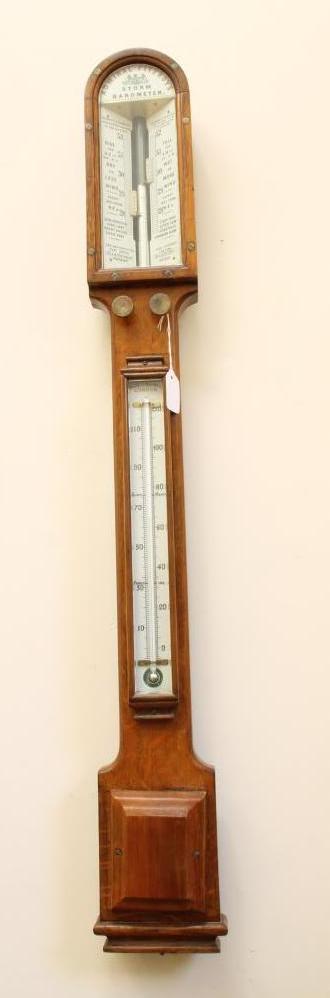A VICTORIAN ADMIRAL FITZROY OAK CASED BAROMETER by Negretti & Zambra Image