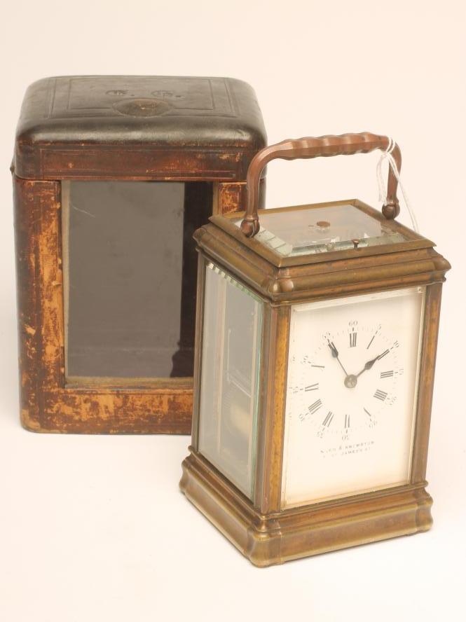 A BRASS CASED CARRIAGE CLOCK Image