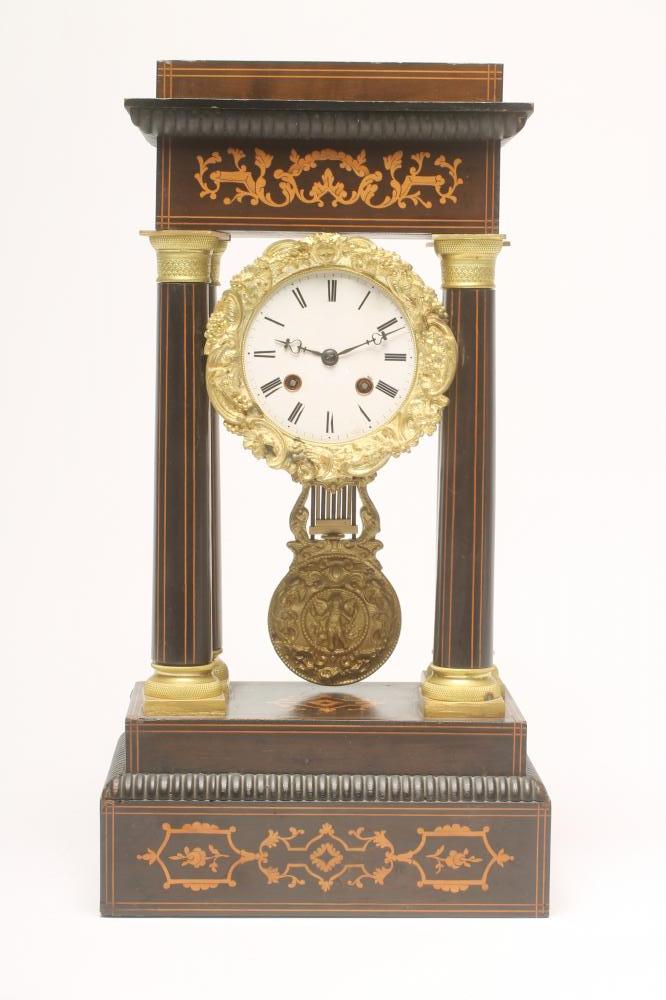 A FRENCH EBONISED AND MARQUETRY FOUR PILLAR PORTICO CLOCK Image