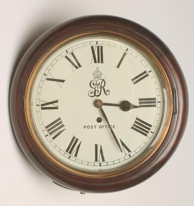 A MAHOGANY CASED WALL TIMEPIECE Image