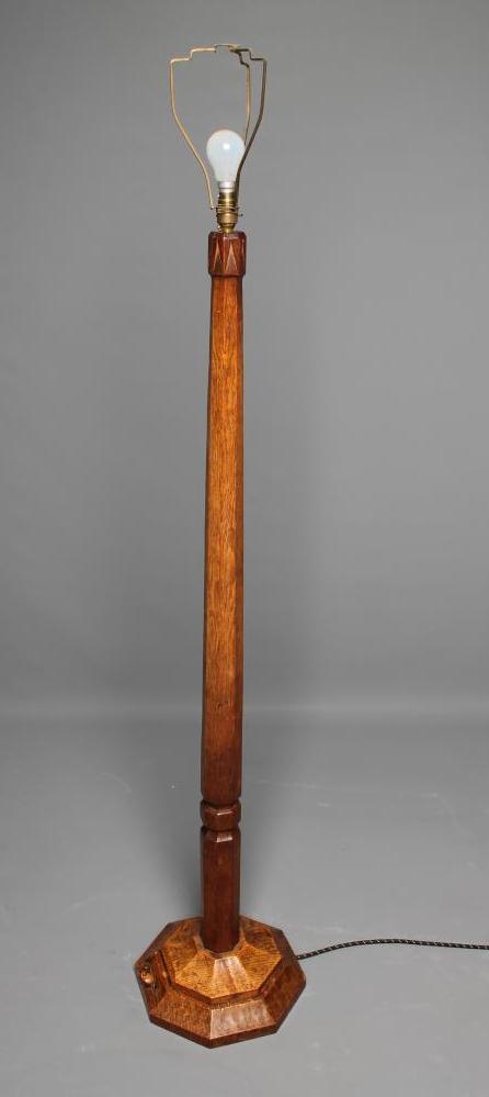 AN ADZED OAK STANDARD LAMP by Robert Thompson Image