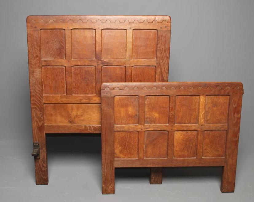 AN ADZED OAK SINGLE BEDSTEAD by Robert Thompson Image