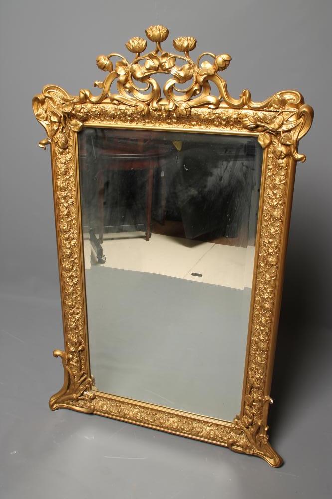 AN ART NOUVEAU STYLE GILDED WOOD AND GESSO PIER GLASS Image