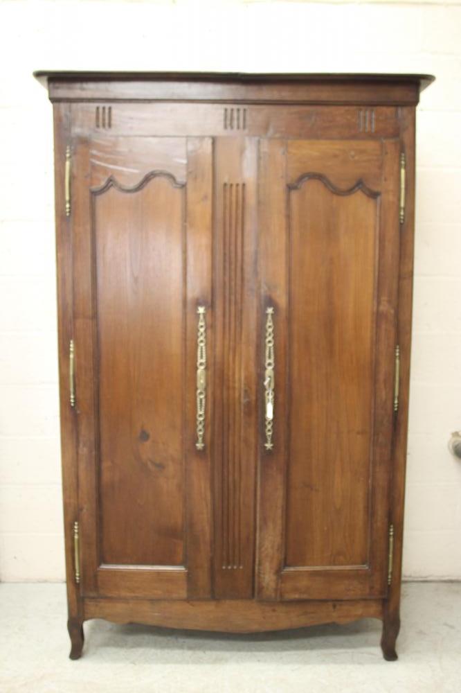 A FRENCH CHESTNUT ARMOIRE Image