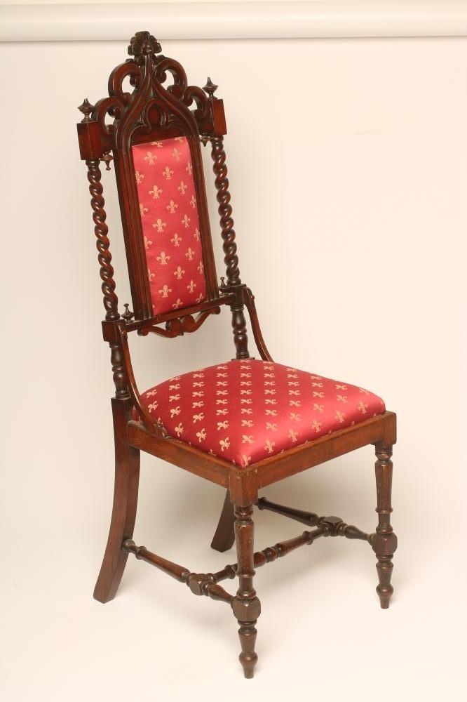 A VICTORIAN GOTHIC WALNUT SIDE CHAIR upholstered in puce damask Image