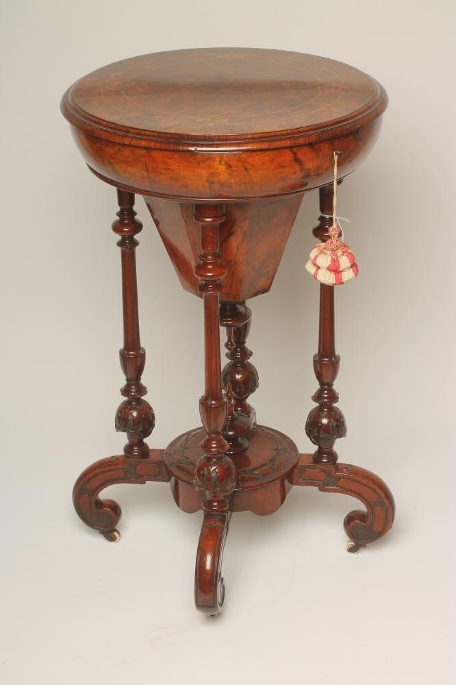 A VICTORIAN WALNUT WORK TABLE Image