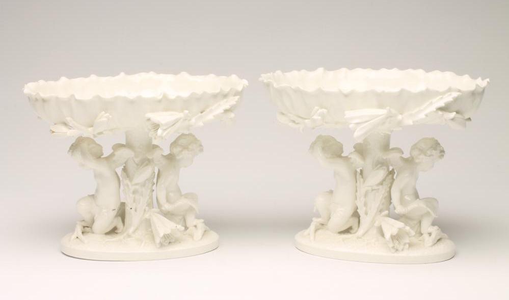 A PAIR OF MOORE BROS. WHITE GLAZED PORCELAIN PEDESTAL TAZZE Image