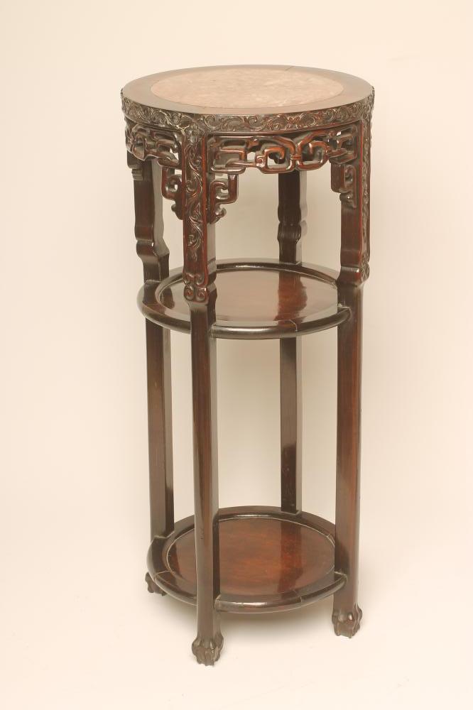 A CHINESE PADOUK WOOD JARDINIERE STAND of circular form Image