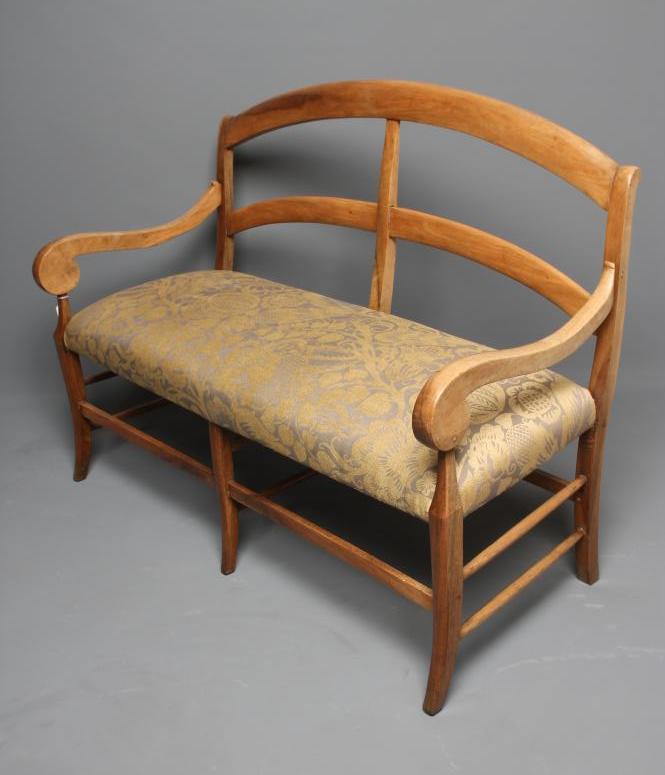A FRENCH FRUITWOOD CHAIR SETTEE Image