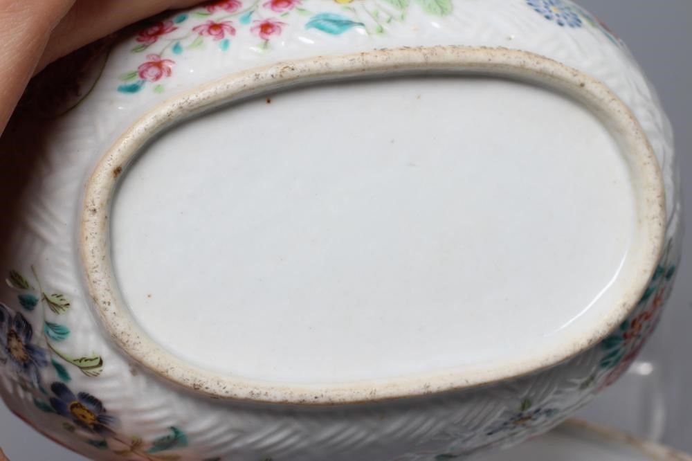 A PAIR OF CHINESE PORCELAIN SMALL DISHES of oval form with basket weave moulding, painted in Image