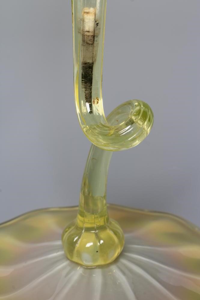 A PAIR OF VICTORIAN YELLOW AND GREEN VASELINE GLASS "JACK IN THE PULPIT" VASES, the twisted stems on Image
