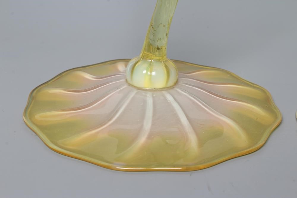 A PAIR OF VICTORIAN YELLOW AND GREEN VASELINE GLASS "JACK IN THE PULPIT" VASES, the twisted stems on Image