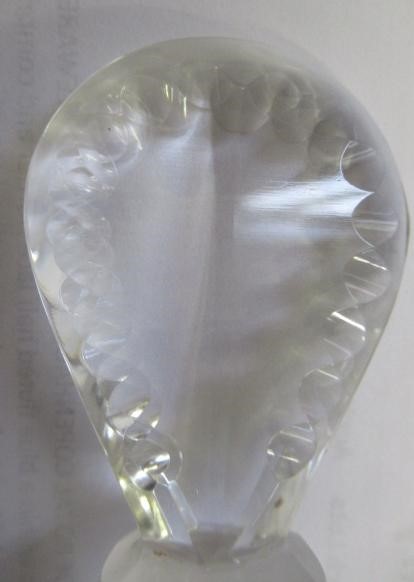 A PAIR OF GEORGIAN GLASS TAPERING DECANTERS with printe cut lozenge stoppers Image