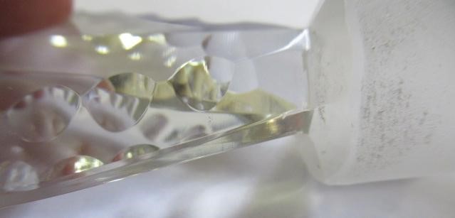 A PAIR OF GEORGIAN GLASS TAPERING DECANTERS with printe cut lozenge stoppers Image