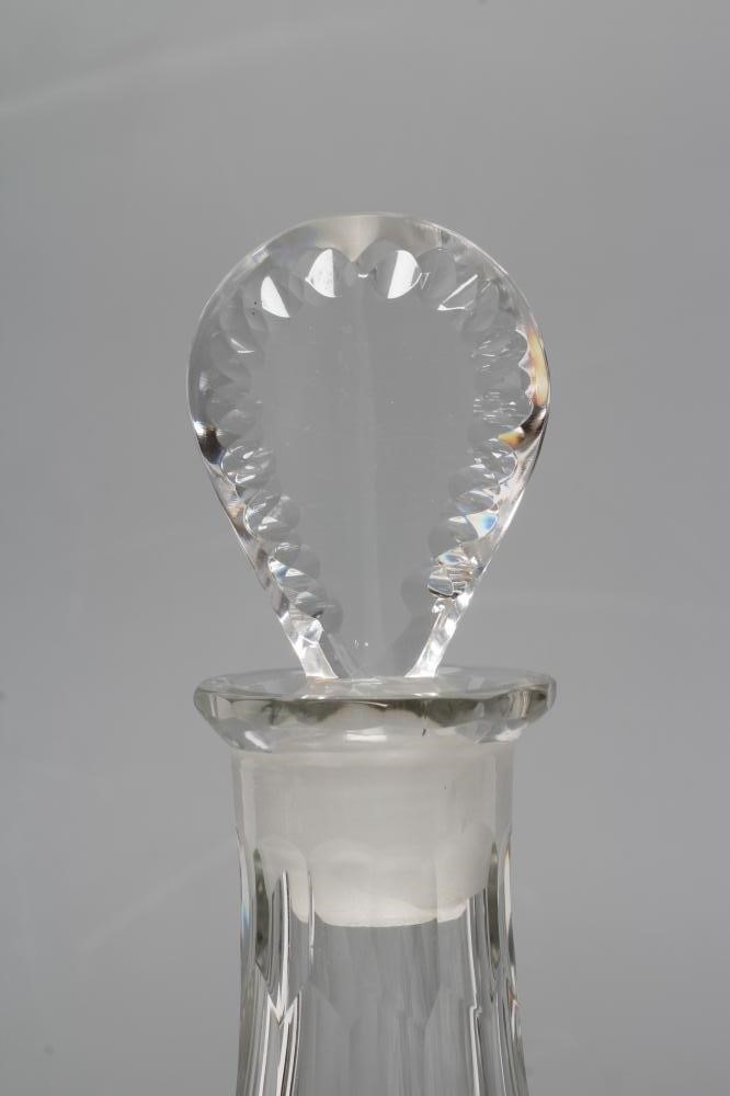 A PAIR OF GEORGIAN GLASS TAPERING DECANTERS with printe cut lozenge stoppers Image