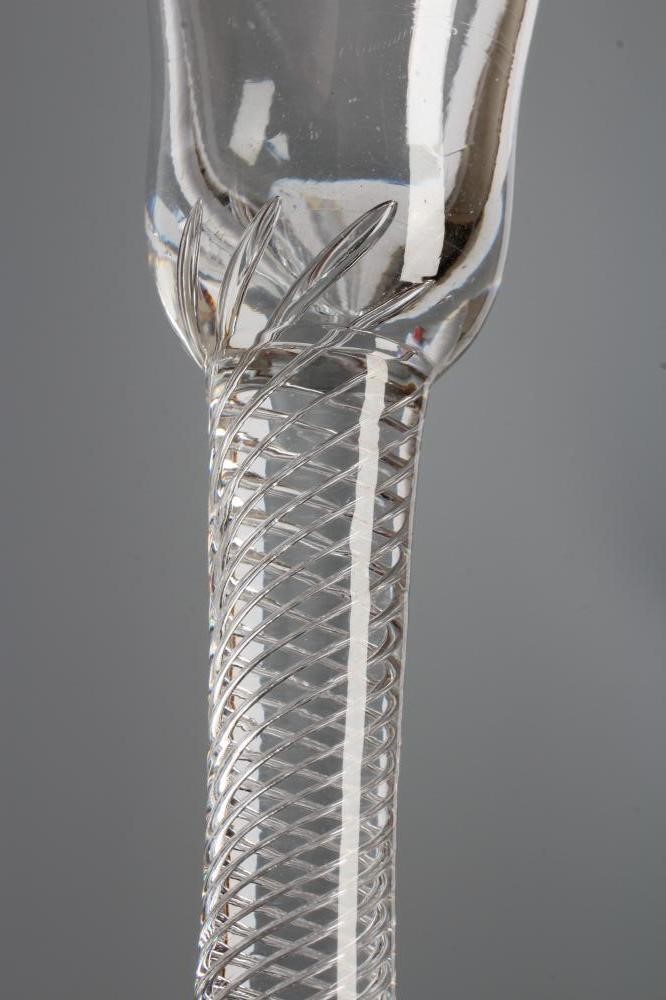 A WINE GLASS, mid 18th century, the bell bowl on a composite multiple spiral air twist stem with Image