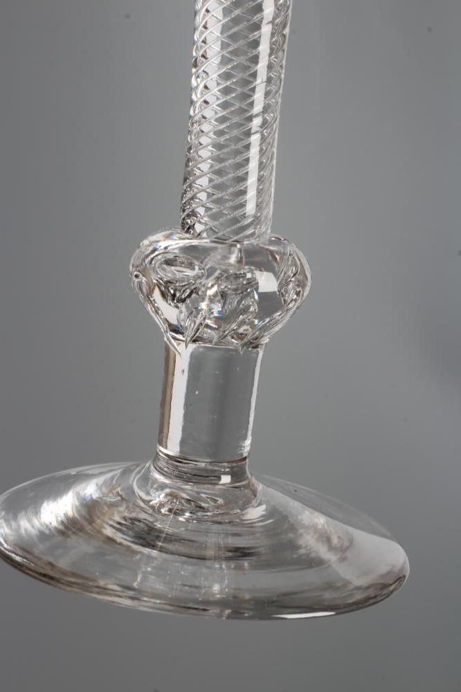 A WINE GLASS, mid 18th century, the bell bowl on a composite multiple spiral air twist stem with Image