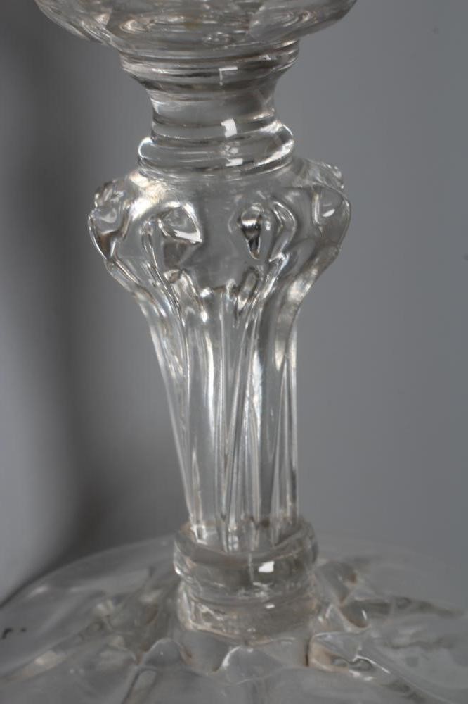 A GLASS SWEETMEAT, late 18th century, the double ogee bowl with panel cutting on a wrythen moulded Image
