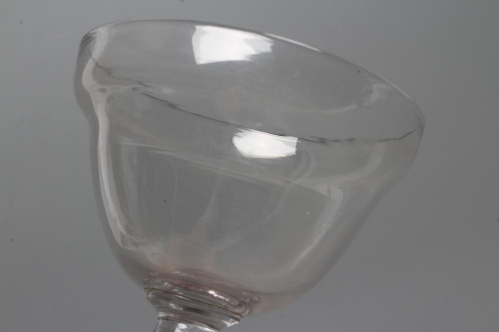 A GLASS GOBLET, late 18th century, the plain double ogee bowl on a wrythen moulded flared Image
