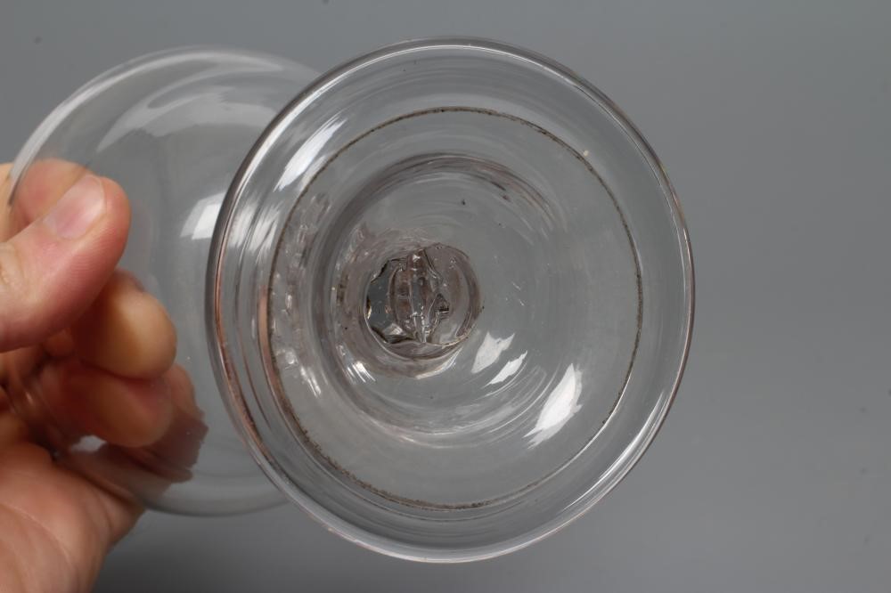 A GLASS GOBLET, late 18th century, the plain double ogee bowl on a wrythen moulded flared Image