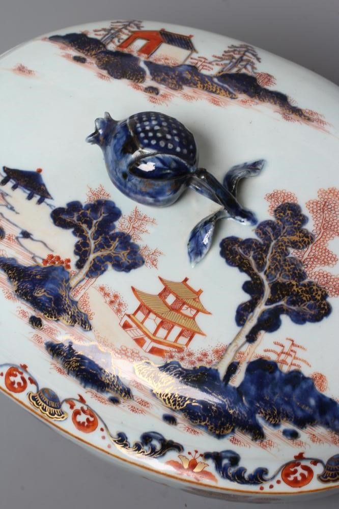 A CHINESE IMARI PORCELAIN TUREEN AND COVER of oval form with pomegranate knop and two rabbit head Image