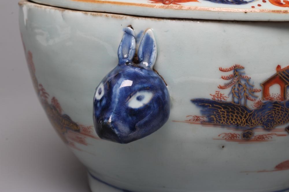 A CHINESE IMARI PORCELAIN TUREEN AND COVER of oval form with pomegranate knop and two rabbit head Image