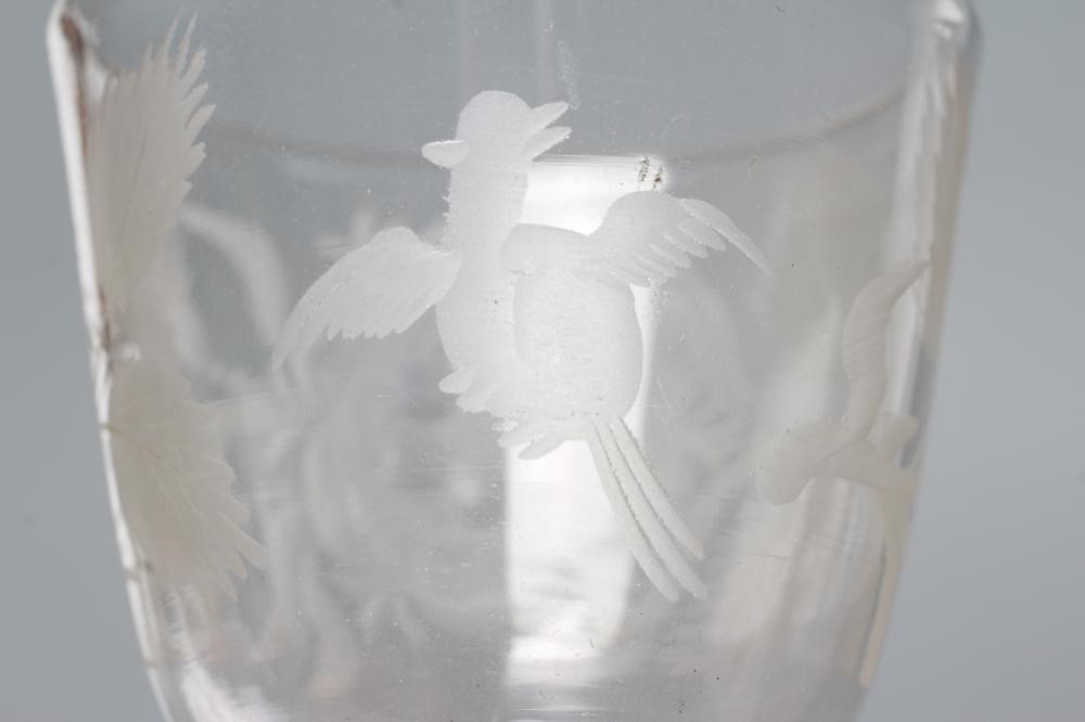A JACOBITE CORDIAL GLASS, mid 18th century, the round funnel bowl engraved with a rose and two buds Image