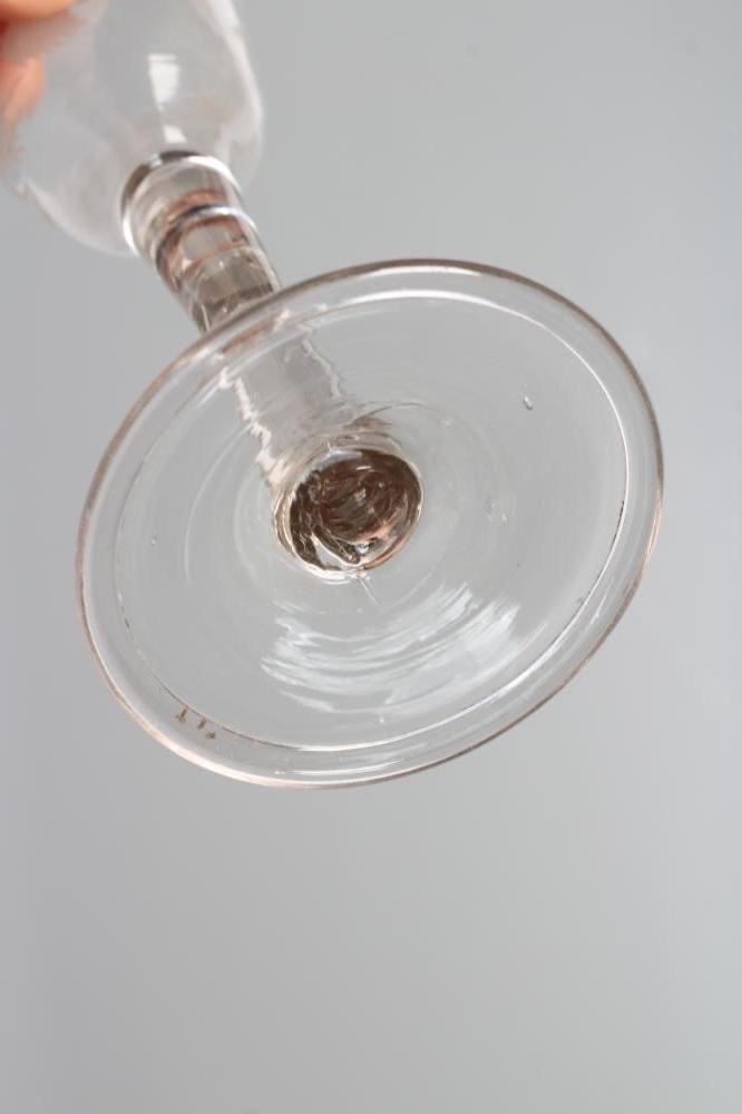 A JACOBITE CORDIAL GLASS, mid 18th century, the round funnel bowl engraved with a rose and two buds Image