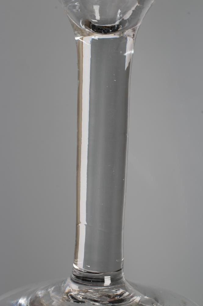 A JACOBITE WINE GLASS, mid 18th century, the ogee bowl engraved with oak leaves, a moth and other Image