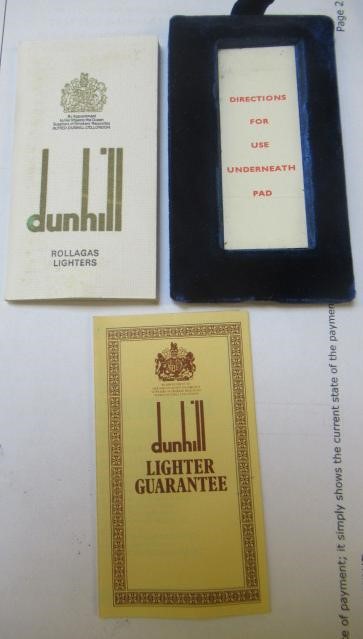 A DUNHILL 9CT GOLD ROLLAGAS CIGARETTE LIGHTER of plain oblong form with engine turning, 2 1/2" high, Image