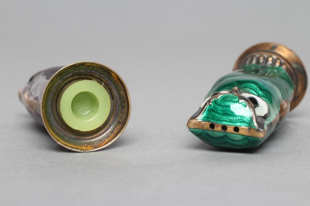 A PAIR OF NORWEGIAN SILVER GILT AND ENAMEL OWL PEPPERETTES Image
